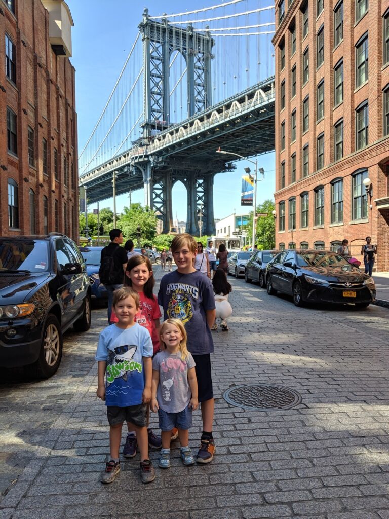 Kids in DUMBO by Manhattan Bridge